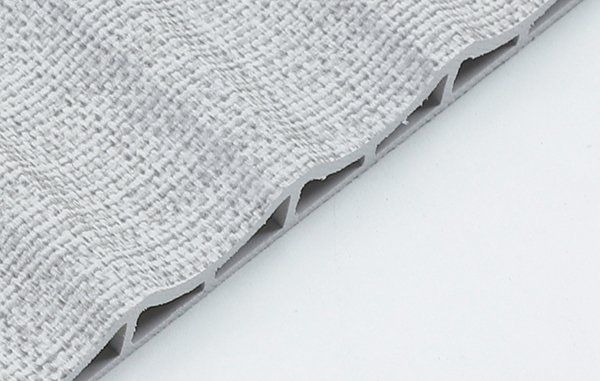 WPC PANEL TEXTIL GRIS 19.6X290